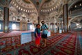 Manavgat, Turkey - August 28 2020: Central Mosque complex, Interior. Magnificent mosque Couple of tourists posing in masks Merkez Royalty Free Stock Photo