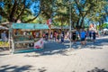 Manavgat, Turkey - September 8, 2022: People buying souvenirs near natural landmark of manavgat waterfall with waterfall