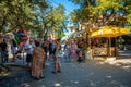 Manavgat, Turkey - September 8, 2022: People buying souvenirs near natural landmark of manavgat waterfall with waterfall