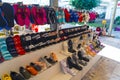 10.11.2022 Manavgat, Turkey - Shoes slides slippers and flip-flops displayed in shopping stall at Turkish Bazaar