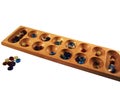 Mancala board and stones Royalty Free Stock Photo