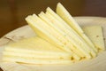 Manchego cheese cut into slices Royalty Free Stock Photo