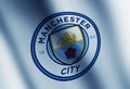 Manchester City flag-waving editorial backdrop with blue light. Football team