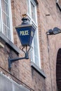 Manchester England - Old fashioned British blue police station street lamp Royalty Free Stock Photo