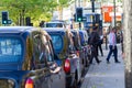 A row of black cabs waiting for customers Royalty Free Stock Photo