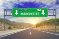 Manchester road sign on highway Royalty Free Stock Photo