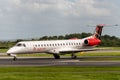 MANCHESTER UK, AUGUST 20 2020: Loganair airlines Embraer ERJ-145EP flight LM525 from the Isle of Man, UK, is documented taxying on Royalty Free Stock Photo