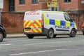 Manchester, UK Police van on the city streets ensuring safety. Royalty Free Stock Photo