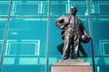 Sir Matt Busby Bronze statue at Old Trafford stadium in Manchester, UK