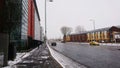 typical Manchester street with people walking on a snowy day on the University of Manchester campus Royalty Free Stock Photo