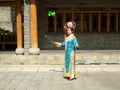 Manchirian girl juggling diabolo Royalty Free Stock Photo