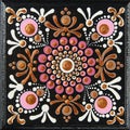 Mandala dot art painting on wood tiles. Beautiful mandala hand painted by colorful dots on black wood. National patterns Royalty Free Stock Photo