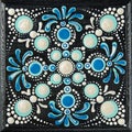 Mandala dot art painting on wood tiles. Beautiful mandala hand painted by colorful dots on black wood. National patterns Royalty Free Stock Photo