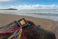 Mandala Eye of God Mexican Huichol Crafts on trunk in Sayulita beach. Royalty Free Stock Photo