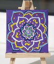 Mandala painted with multi-colored oil paints on canvas Royalty Free Stock Photo