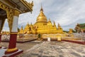 Kuthodaw Pagoda, golden yellow Buddhist religious structure in the Mandalay, Burma