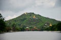 Mandalay Hill with moat at front of Mandalay Palace in Mandalay, Myanmar