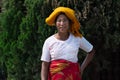 Mandalay, Myanmar - April 2019: portrait of Burmese woman with orange wrap on her head