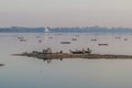 MANDALAY, MYANMAR - DECEMBER 4, 2016: Boats on Taungthaman lake in Amarapura near Mandalay, Myanm Royalty Free Stock Photo