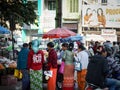 Mandalay, Myanmar - Woman wearing checked shirt with a word EXO, the famous K-POP boy group.