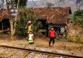 Children selling snack at railway station