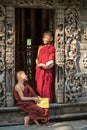 MANDALAY,MYANMAR - FEB 18 : Young Novice monks standing and look