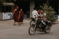 Mandalay Myanmar , a group of Burmese people passing through a street