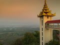 Mandalay, Myanmar - January 2020: Sunset views from Su Taung Pyae Pagoda, on Mandalay Hill