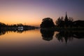 Mandalay Palace wall with reflection in moat, picturesque silhouette with twilight sky in sunset Royalty Free Stock Photo