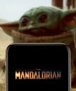 The Mandalorian logo smart phone that is a web television series. BABY YODA