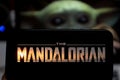 The Mandalorian logo smart phone that is a web television series. BABY YODA