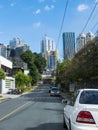 Mandaluyong, Metro Manila, Philippines - The Ortigas Skyline as seen from a street inside Wack Wack Village, an Royalty Free Stock Photo