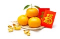 Mandarin orange, chinese gold and red packet Royalty Free Stock Photo