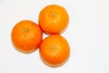 Three mandarins isolated on white background and space for your text.