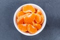 Mandarin oranges fruits from above bowl slate Royalty Free Stock Photo
