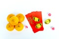Mandarin oranges, golden ingot and angpow Royalty Free Stock Photo