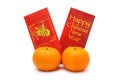 Mandarin Oranges And Red Packets Royalty Free Stock Photo