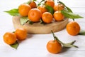 Mandarin Oranges on rustic white wooden background