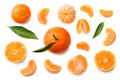 mandarin with slices and green leaf isolated on white background top view Royalty Free Stock Photo