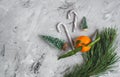 Mandarine with Leaves and Lights, Tangerine Orange on Gray Table Background Christmas New Year Decors Royalty Free Stock Photo