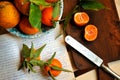 Mandarines and oranges on a vintage background