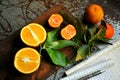 Mandarines and oranges on a vintage background