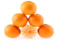 Mandarines, pyramid on white background Royalty Free Stock Photo