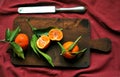 Mandarines still life with a wooden board