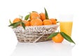 Mandarines in white wooden basket.