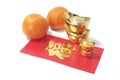 Mandarins, gold Ingots and Red Packet Royalty Free Stock Photo