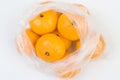Mandarins in the polyethylene bag Royalty Free Stock Photo