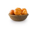 Mandarins in a wooden bowl with copy space for text Royalty Free Stock Photo