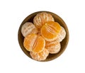 Mandarins in a wooden bowl with copy space for text. Ripe and tasty tangerines isolated on white. Royalty Free Stock Photo