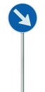 Mandatory keep right European Union EU road sign on pole post, large blue round isolated traffic lane route reroute roadside